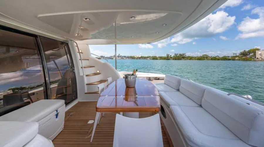 Aft deck of the Sunseeker 74 yacht with champagne on ice for an Art Basel Miami cruise